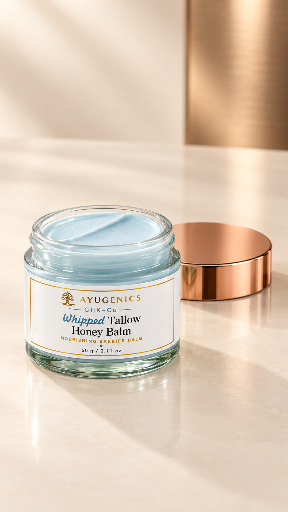 An open jar of whipped balm on a pale surface